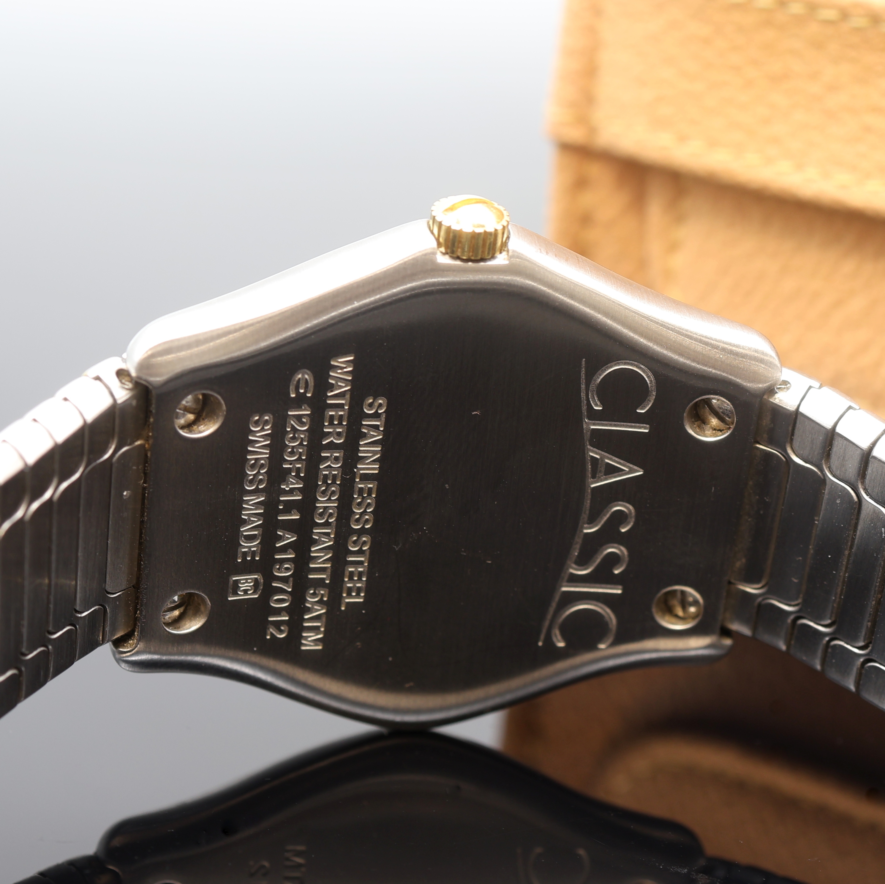 Detail d: EBEL Classic Herrenarmbanduhr Referenz 1255F41.1, Schweiz um 2015, quarz, Edelstahlgeh. inkl. orig. Gliederband m. dopp. Faltschl., GG -Lünette ...