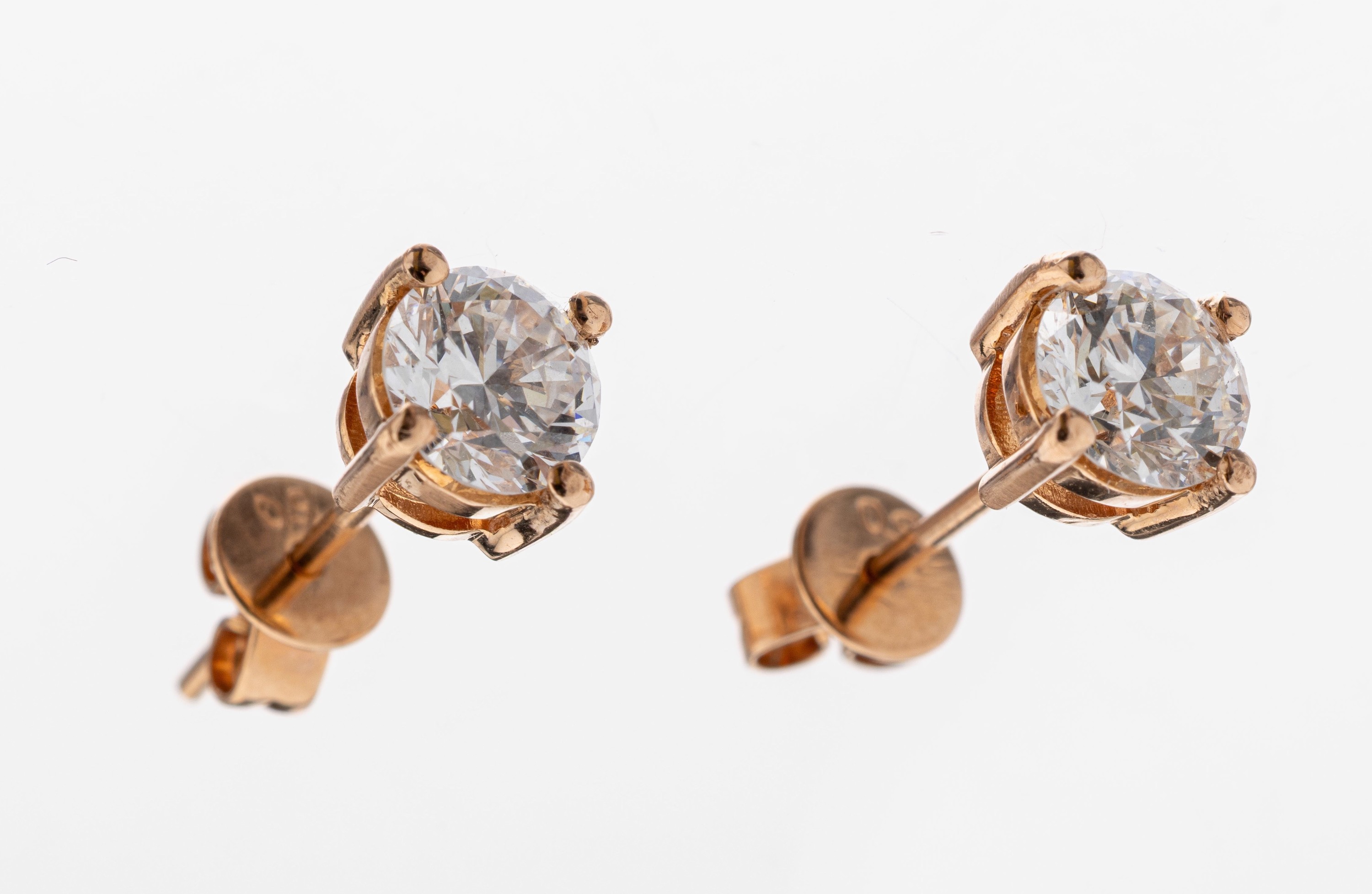 Image 27109346 - Paar 14 kt Gold Brillant-Ohrstecker, RG 585/000, 2 Brillanten zus. ca. 1.02 ct ...