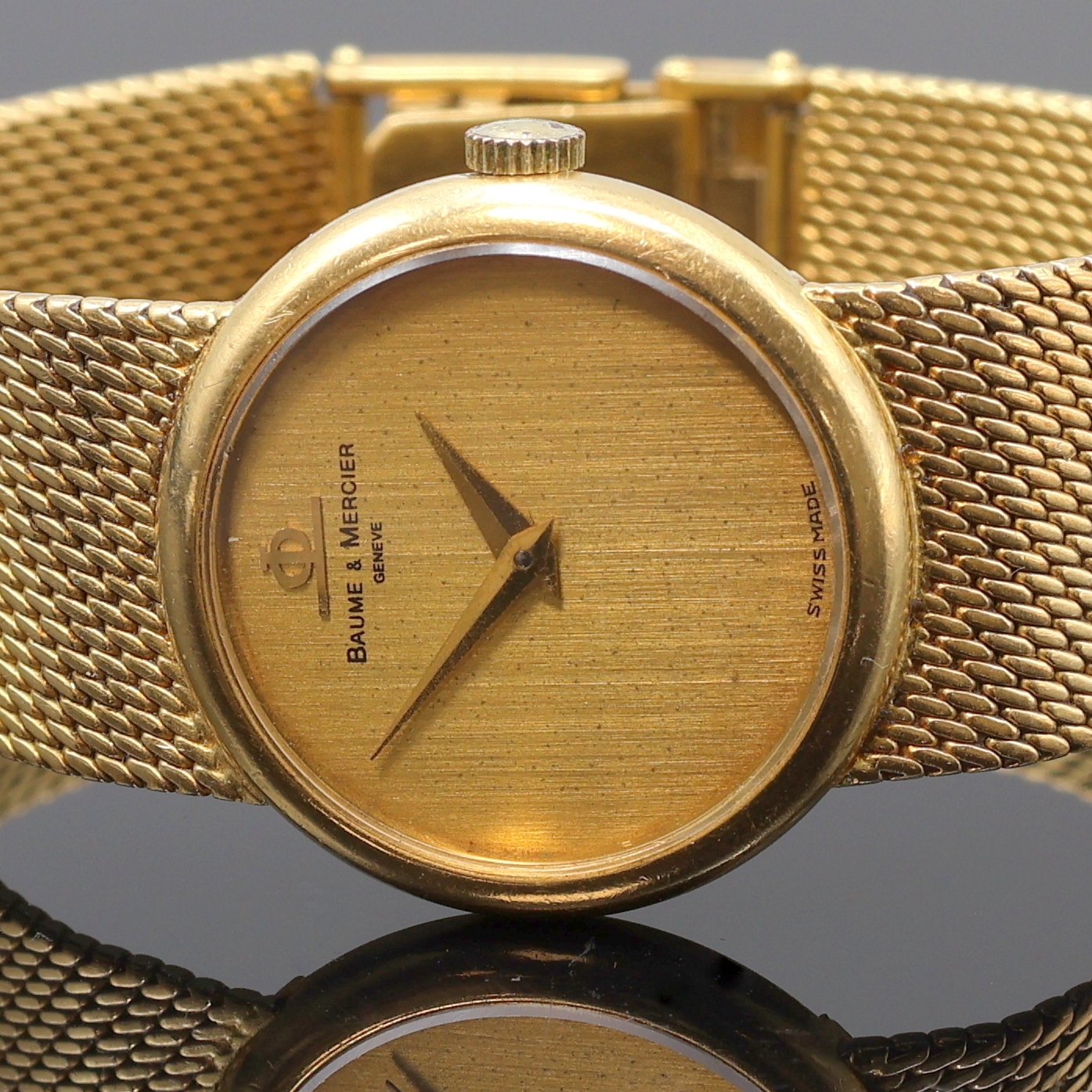 Detail a: BAUME & MERCIER Damenarmbanduhr in GG 750/000, Schweiz um 1970, Handaufzug, orig. Goldband, Boden aufgedr., champagnerfarb. Zifferbl. pat./fl., gold. ...