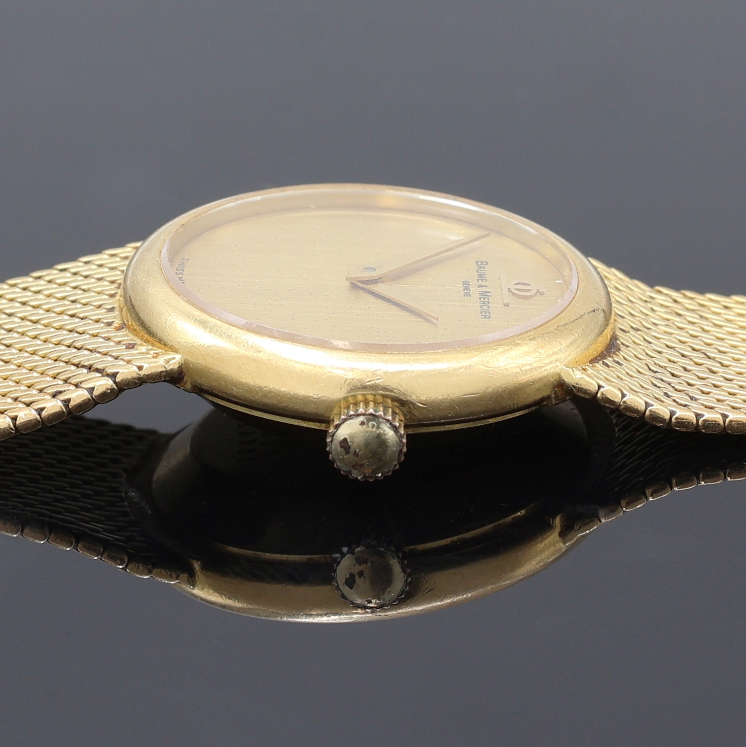 Detail d: BAUME & MERCIER Damenarmbanduhr in GG 750/000, Schweiz um 1970, Handaufzug, orig. Goldband, Boden aufgedr., champagnerfarb. Zifferbl. pat./fl., gold. ...