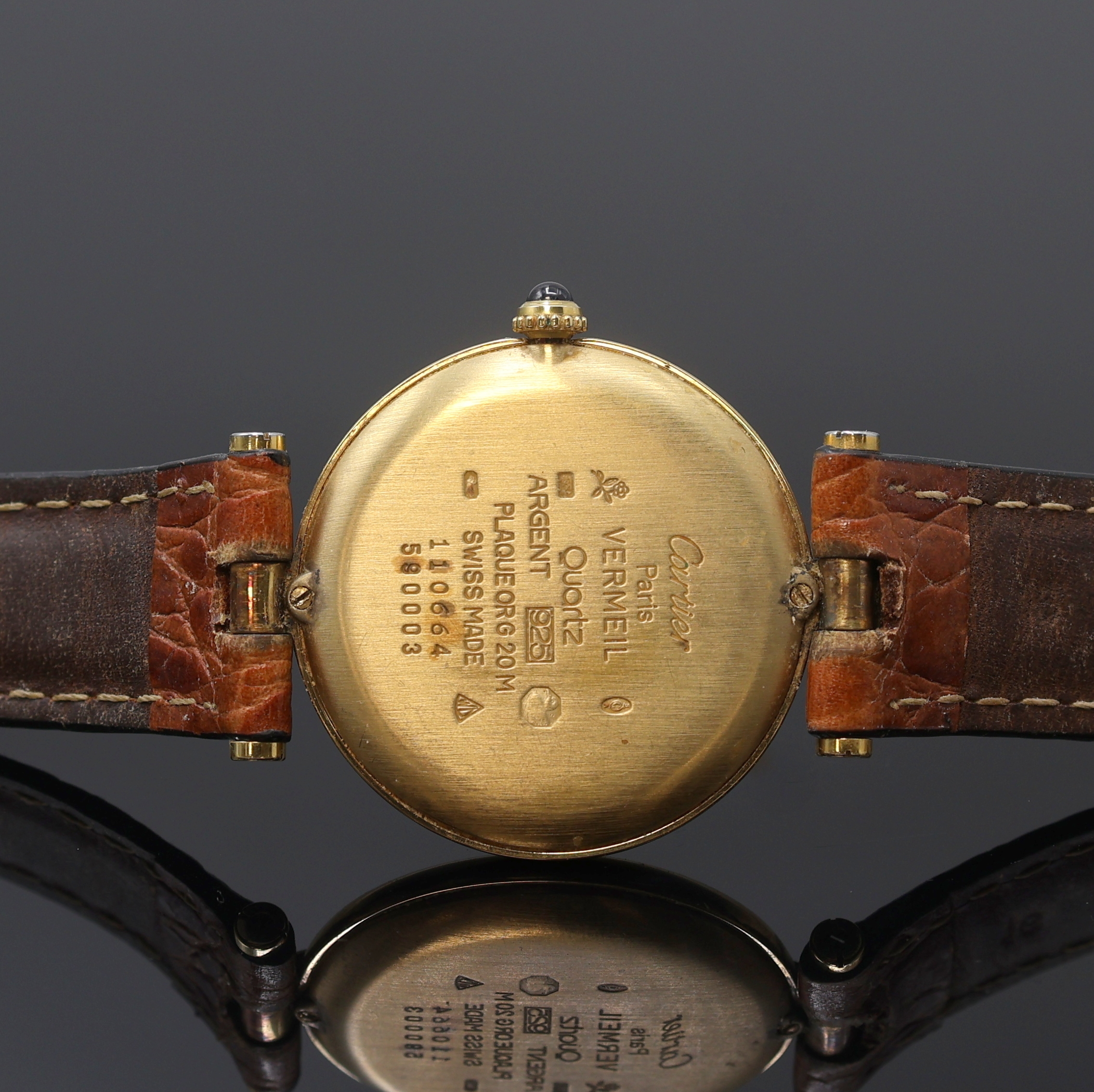 Detail d: CARTIER Damenarmbanduhr Vermeil Referenz 590003, Schweiz um 1995, quarz, verg. Silbergeh. inkl. Lederband (zu ers.) m. orig. verg. Dornschl., ...