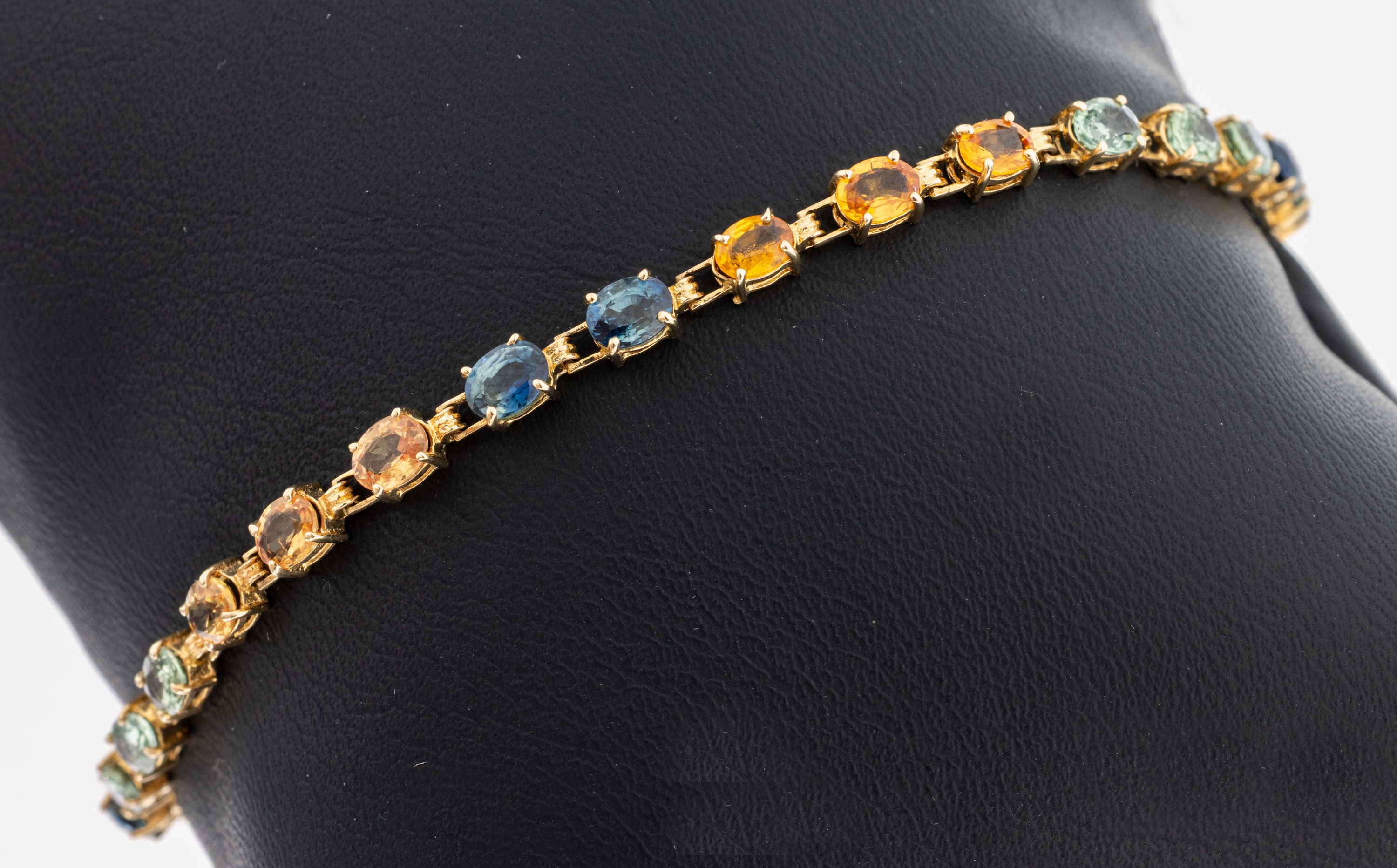 Image 27109783 - 14 kt Gold Saphir-Armband, GG 585/000, ovalfacett. Saphire in Blau, Grün und Gelb zus. ...