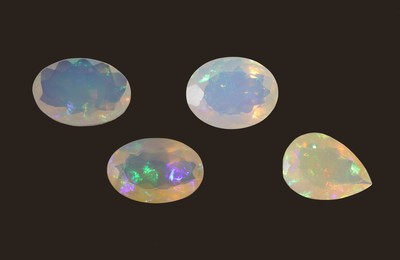 27109989b - Lot 4 lose Opale, zus. ca. 15.93 ct, 3 x ovalfacett., 1 x facett. Tropfen, versch. ...