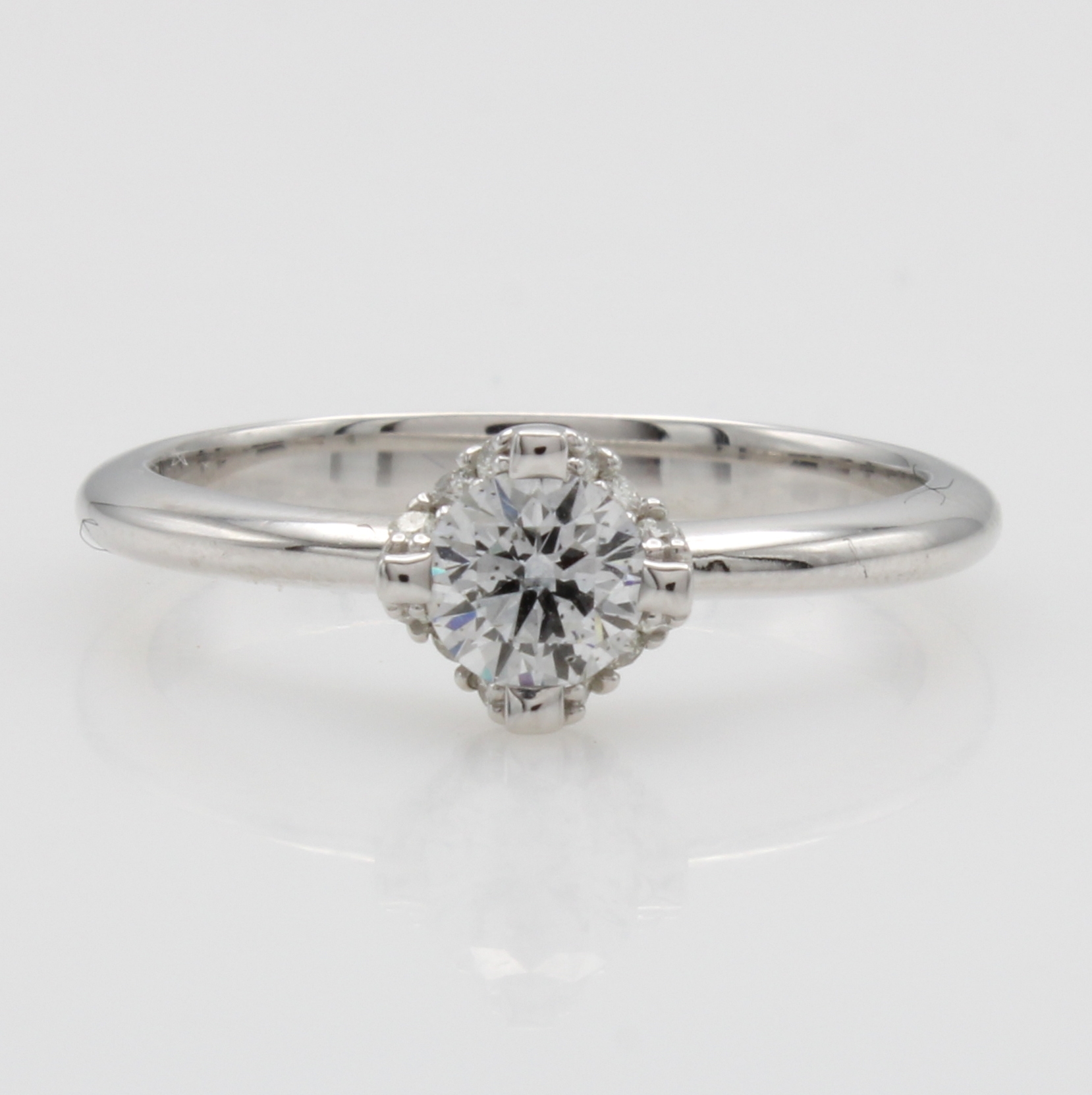 Image 27110106 - Ring mit Brillanten, WG 585/000, Brill.- Solitär ca.0.420 ct und Besatzbrill. an Krap- ...