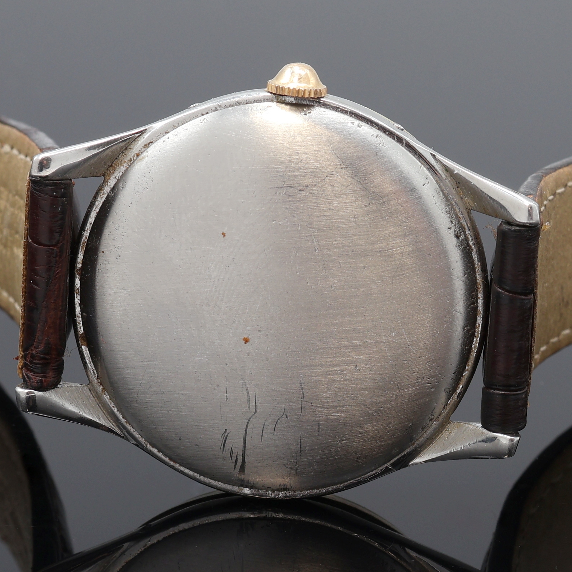Detail f: OMEGA seltene, astronomische Herrenarmbanduhr Serie Cosmic Referenz 2471-7, Schweiz um 1947, Handaufzug, Edelstahlgeh., Boden u. gold. Glasrand ...
