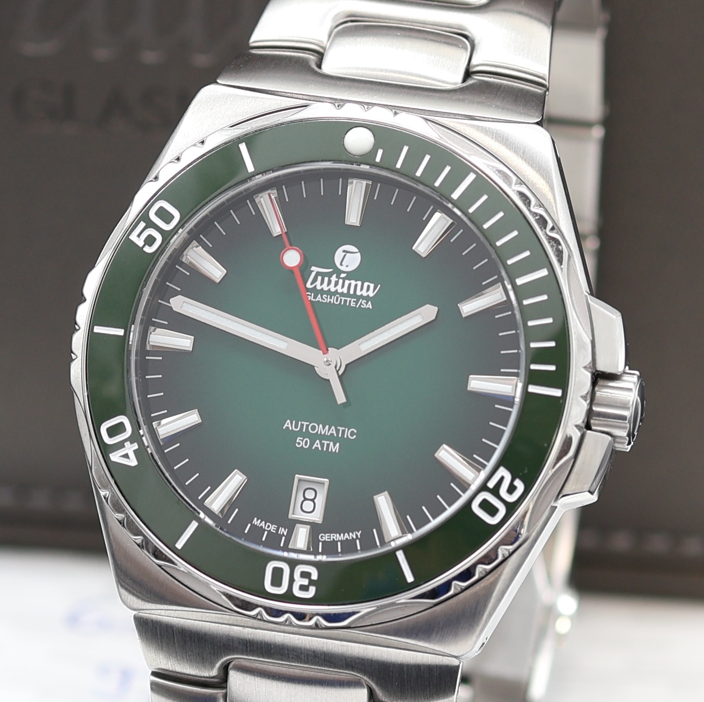 Detail a: TUTIMA M2 Seven Seas Herrenarmbanduhr Referenz 6156-06, Automatik, Edelstahlgeh. inkl. Gliederband m. Faltschl., Boden und Krone verschr., ab Herst. ...
