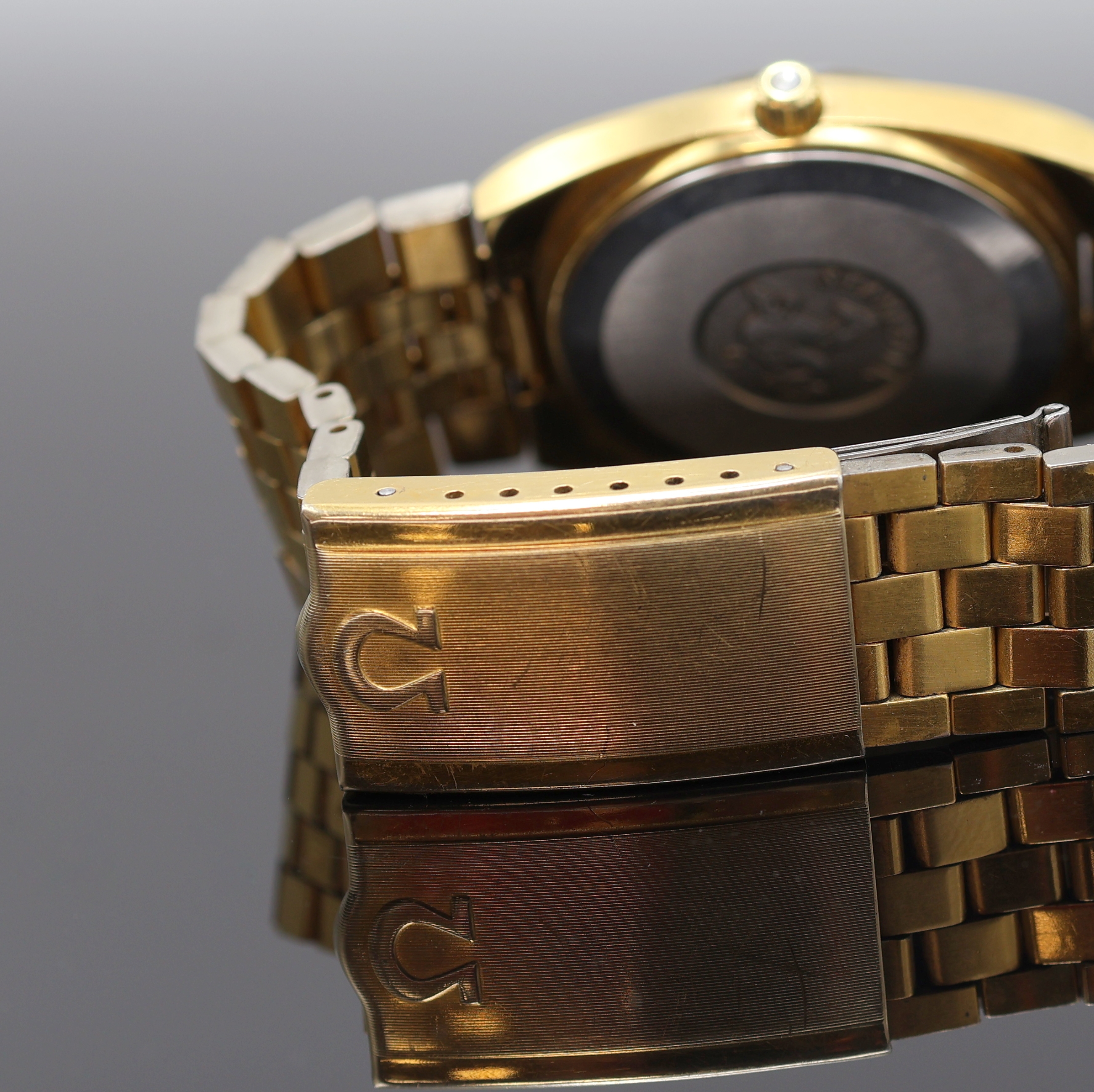 Detail c: OMEGA Seamaster vergoldete Armbanduhr Referenz 196.0083/396.0852, Schweiz um 1980, quarz, Boden m. Seamaster-Logo aufgedr., verg. Omega-Band m. ...