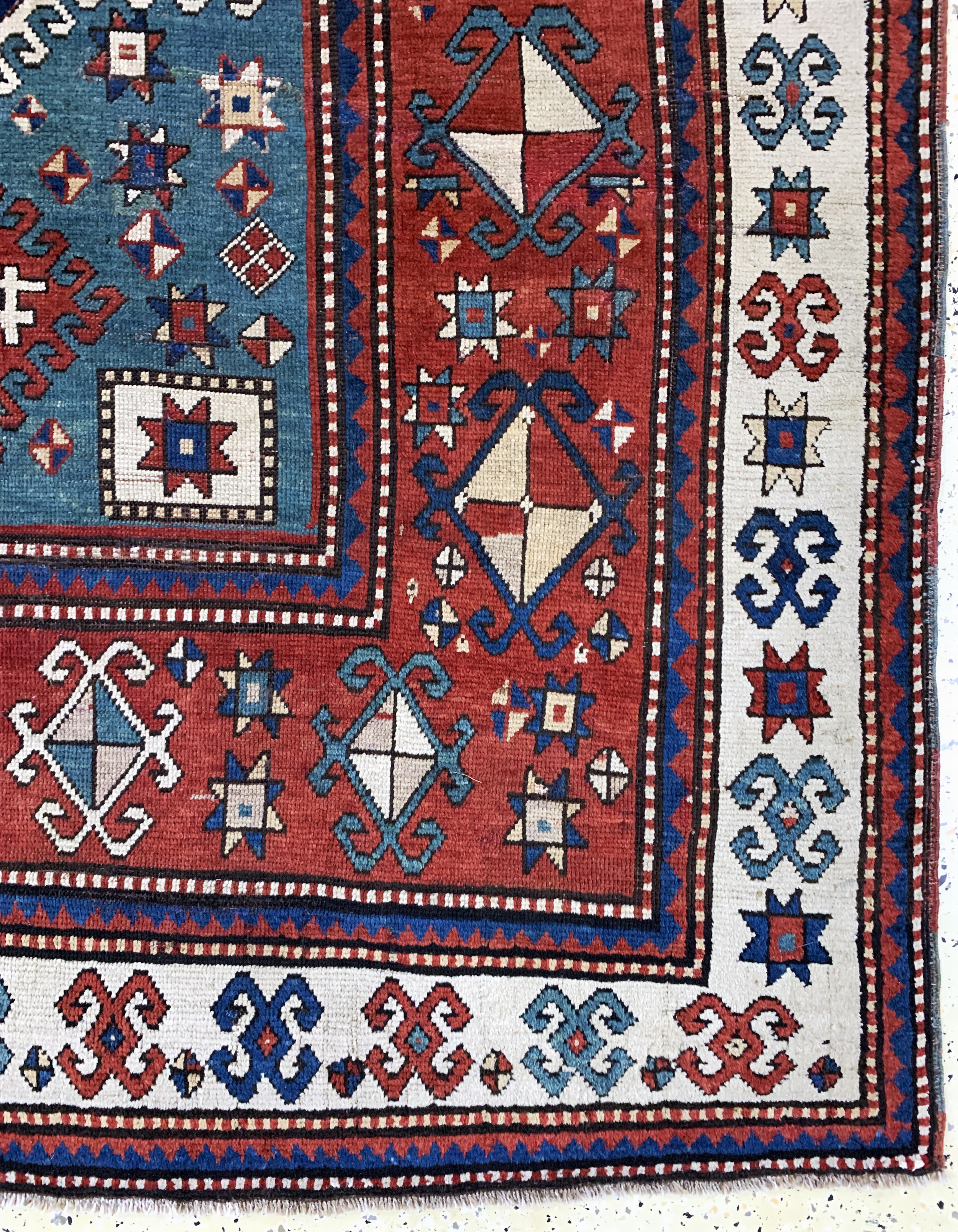 Detail a: "Karachoph-Kazak"antik, Kaukasus, 19.Jhd, Wolle auf Wolle, ca. 260 x 182 cm, EHZ: 2-3, (restauriert)