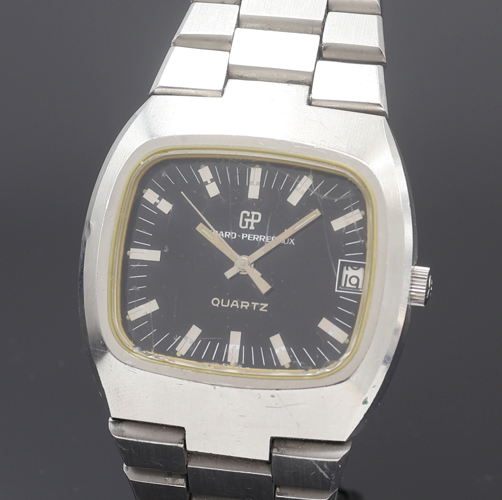 Detail a: GIRARD PERREGAUX Herrenarmbanduhr, Schweiz um 1970, quarz, massives Stahlgeh. inkl. orig. Gliederband, Boden geschr., schwarzes Zifferbl. m. aufges. ...