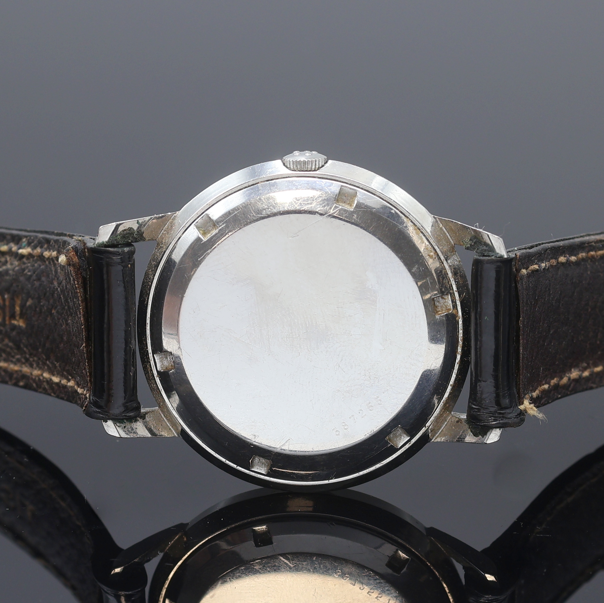 Detail c: ETERNA-MATIC Herrenarmbanduhr in Stahl, Schweiz um 1960, Automatik, Boden verschr., silb. Zifferbl. pat./fl., gold. Std.-Ind., silb. Leuchtzeiger, ...