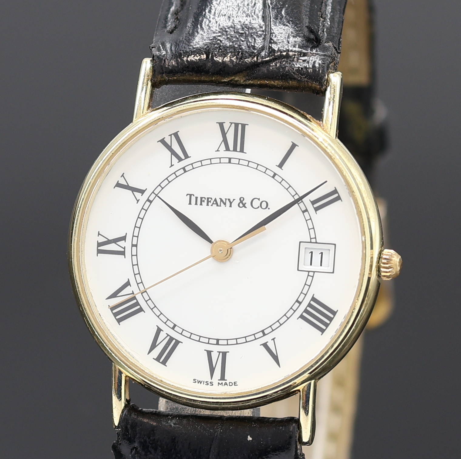 Detail a: Tiffany & Co. Armbanduhr in GG 585/000 Referenz 124.1003, quarz, Schweiz um 1985, 2-teil. Geh., Boden aufgedr., emailfarb. Zifferblatt m. röm. Std., ...