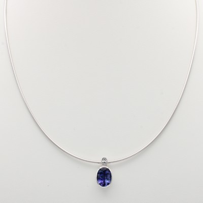27114799a - Anhänger mit Tansanit und Diamant an Omegareif, WG 750/000, ovaler Tansanit ca. 4.9 ct, ...