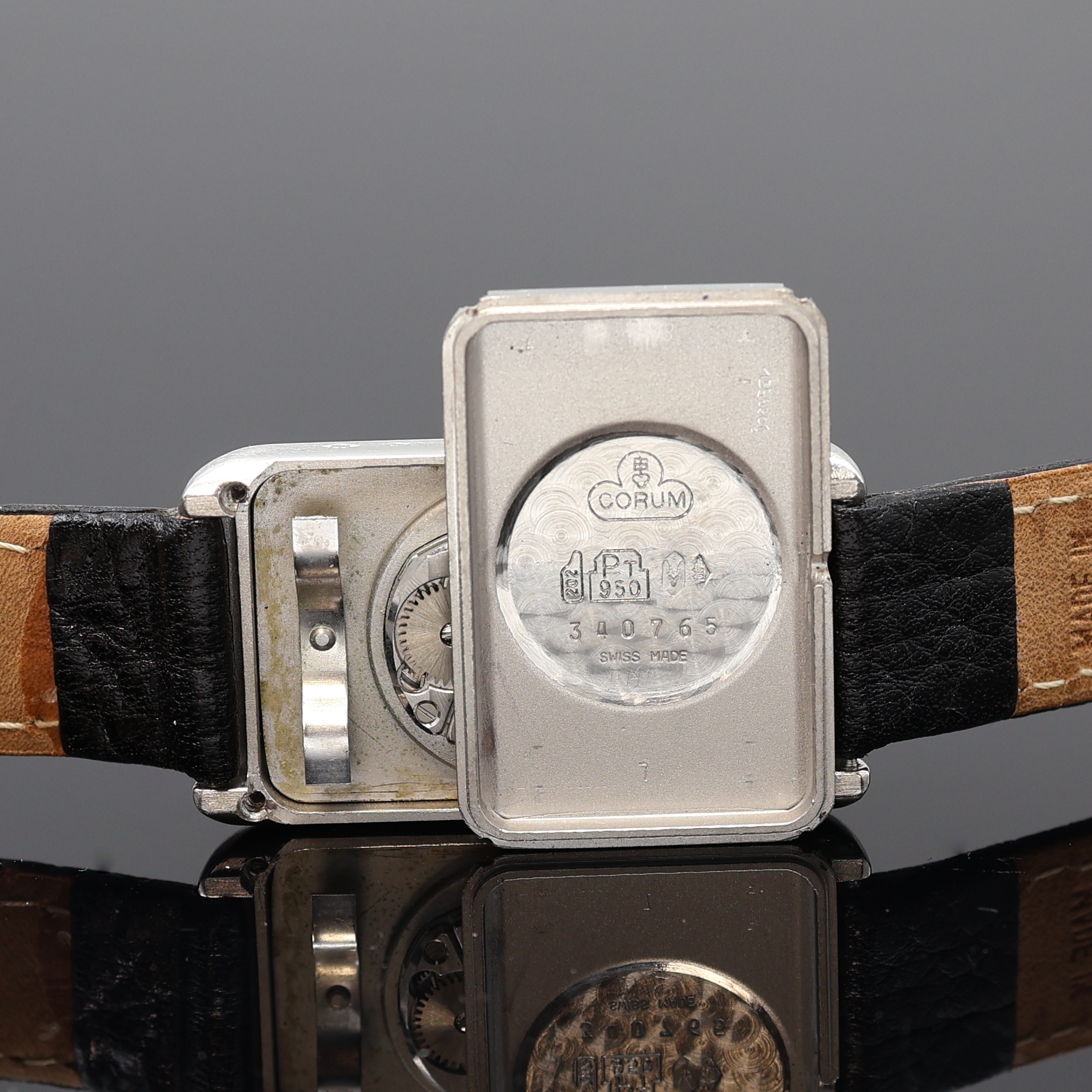 Detail g: CORUM hochfeine und seltene Armbanduhr in Form eines 10g Platinbarrens Nr. 142, Schweiz um 1979, Handaufzug, Platingeh. inkl. Lederband m. orig. ...