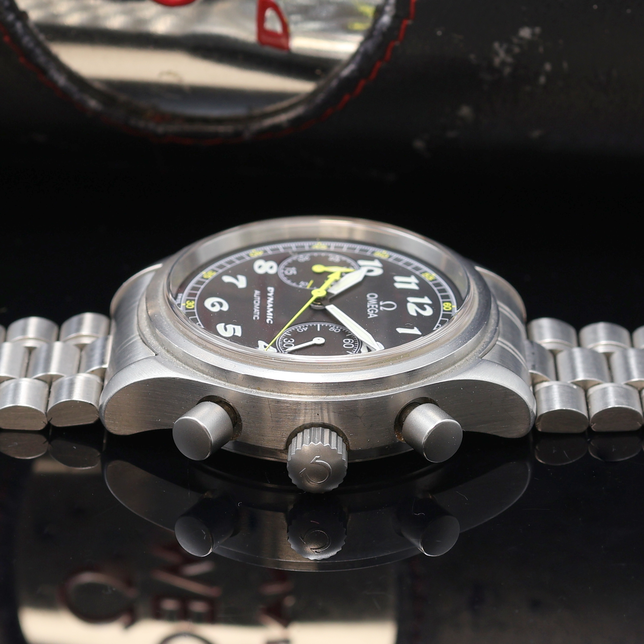 Detail c: OMEGA Dynamic Armbandchronograph Referenz 175.0310, Automatik, Schweiz um 2004, Edelstahlgeh. inkl. orig. Gliederband m. Faltschl., Boden und Krone ...
