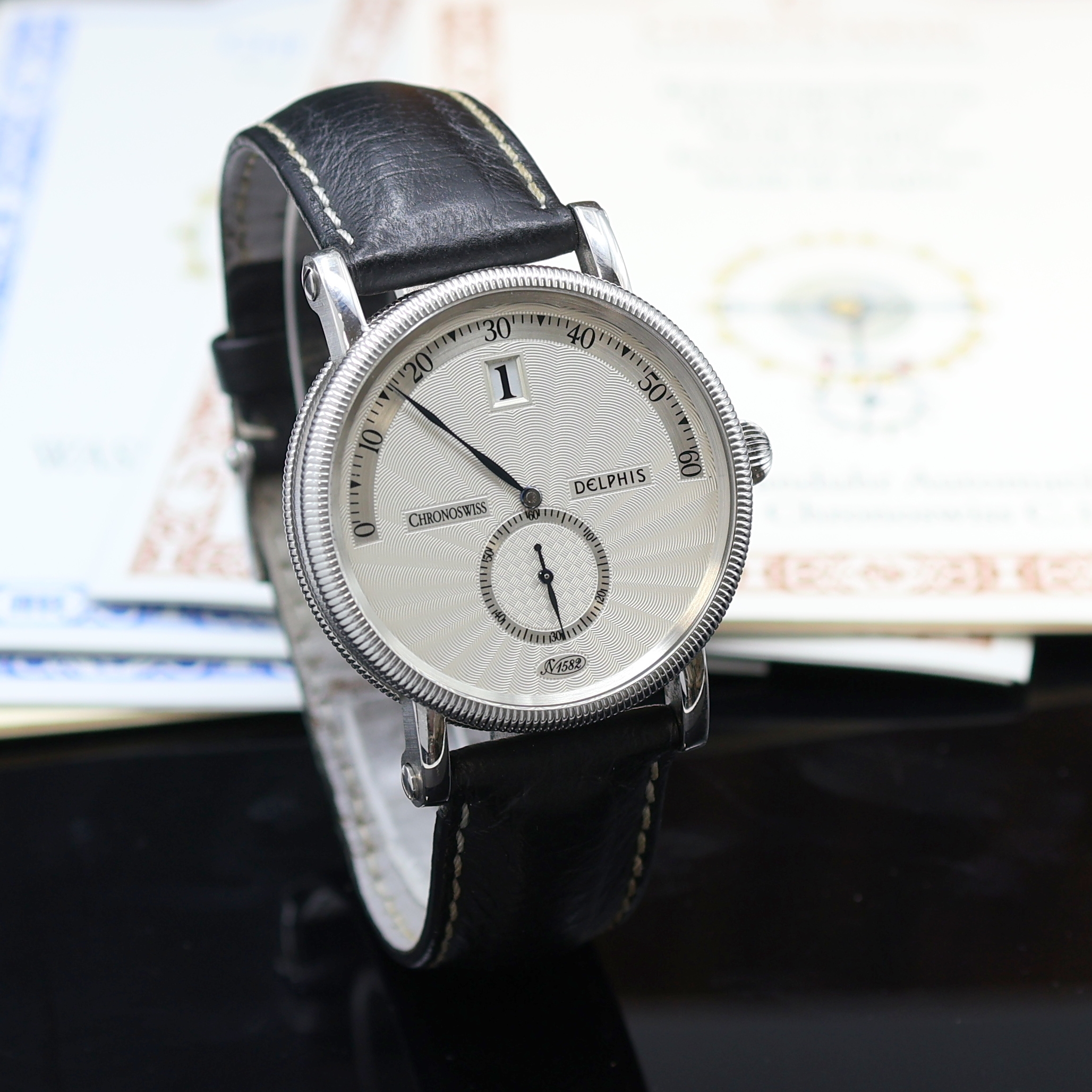 Detail b: CHRONOSWISS Delphis Herrenarmbanduhr in Edelstahl Referenz CH 1423, Automatik, beids. vergl. Geh., Boden geschr., Lederband m. orig. Dornschl., ...