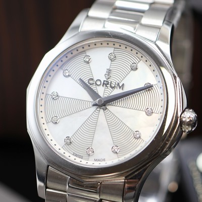 27116306a - CORUM Admiral´s Cup Legend ungetragene Damenarmbanduhr Referenz 020.100.20/V200 PN09, ...