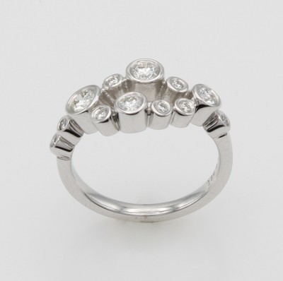 27116703a - Ring mit Brillanten, WG 585/000, z.T. offen gearb., Brill. in Zargenf. zus. ca. 0.66 ct ...