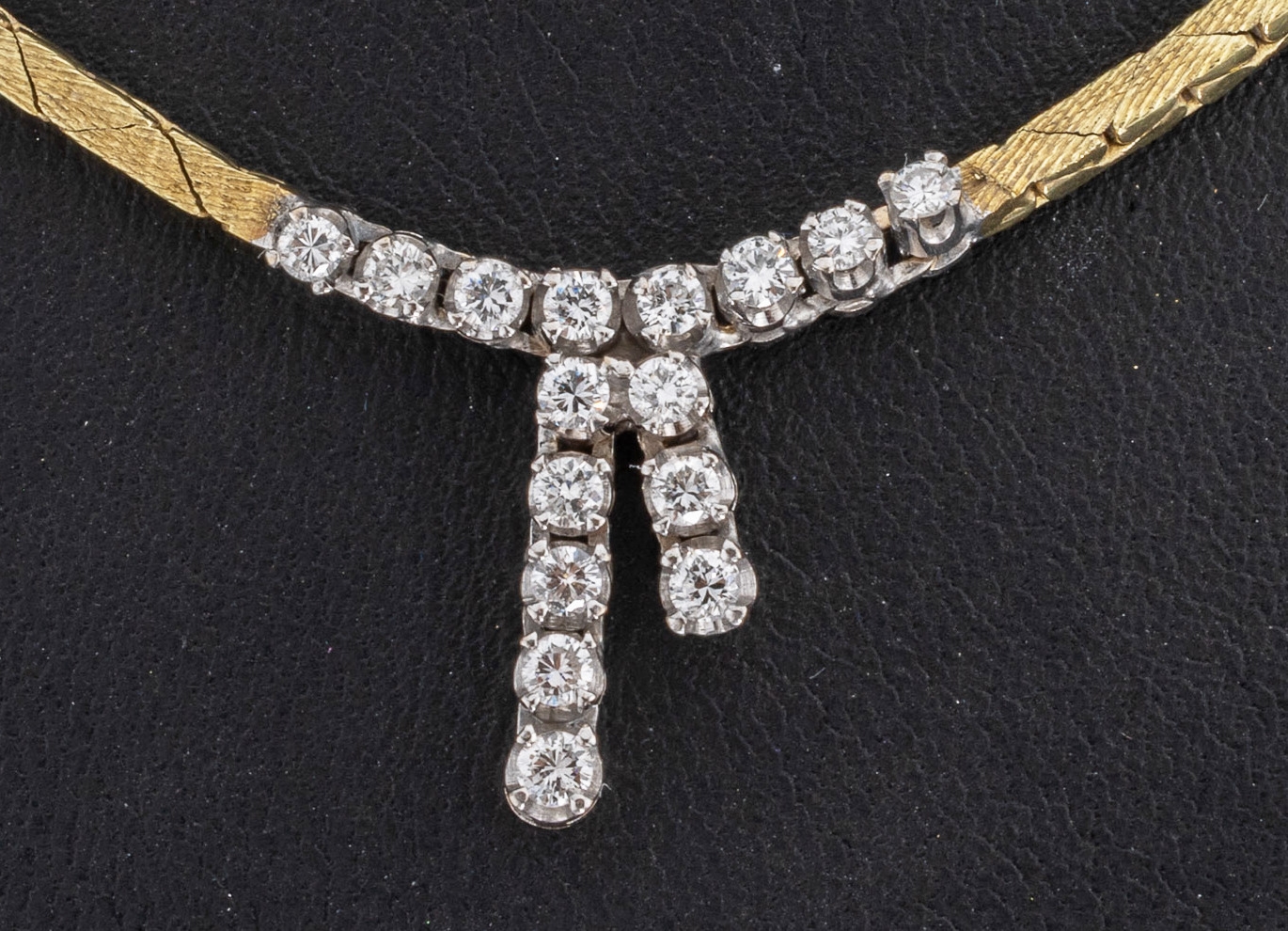 Detail a: 14 kt Gold Brillant-Collier, GG/WG 585/000,16 Brillanten zus. ca. 0.50 ct Weiß/lr, Angaben lt. Zertifikat, L. ca. 43 cm, ca. 18.1g