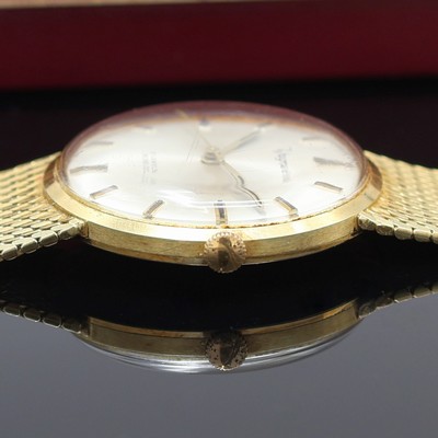 27117436d - Herrenarmbanduhr bezeichnet Wagner in GG 585/000, Schweiz um 1970, Handaufzug, Goldband, ...