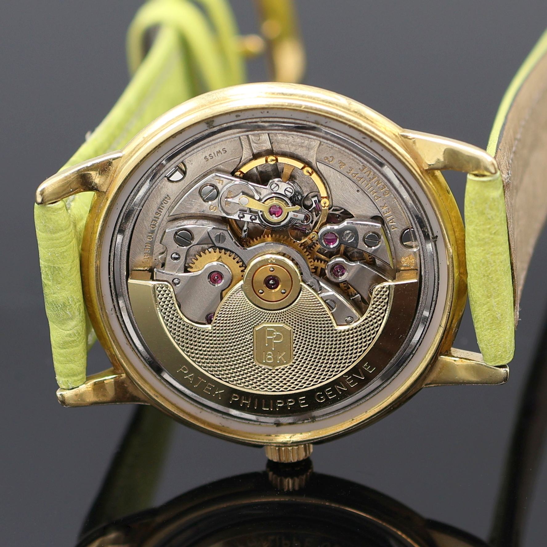 Detail e: PATEK PHILIPPE "Disco Volante" hochfeine und seltene Herrenarmbanduhr in GG 750/000 Referenz 2551, Automatik, Schweiz um 1956, Boden ...