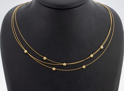 Image 18 kt Gold Brillant-Collier, GG 750/000, 3-rhg., 7 einzeln in Zargen gefasste ...