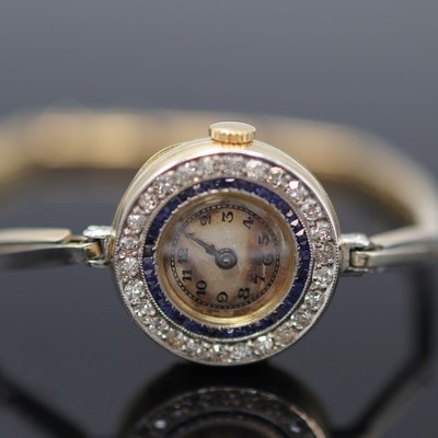 27118000a - Frühe mit Diamanten besetzte Armbanduhr in GG 750/000, Schweiz um 1920, Handaufzug, z. ...