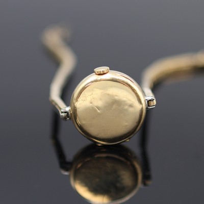 27118000d - Frühe mit Diamanten besetzte Armbanduhr in GG 750/000, Schweiz um 1920, Handaufzug, z. ...