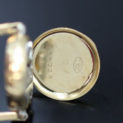 27118000f - Frühe mit Diamanten besetzte Armbanduhr in GG 750/000, Schweiz um 1920, Handaufzug, z. ...