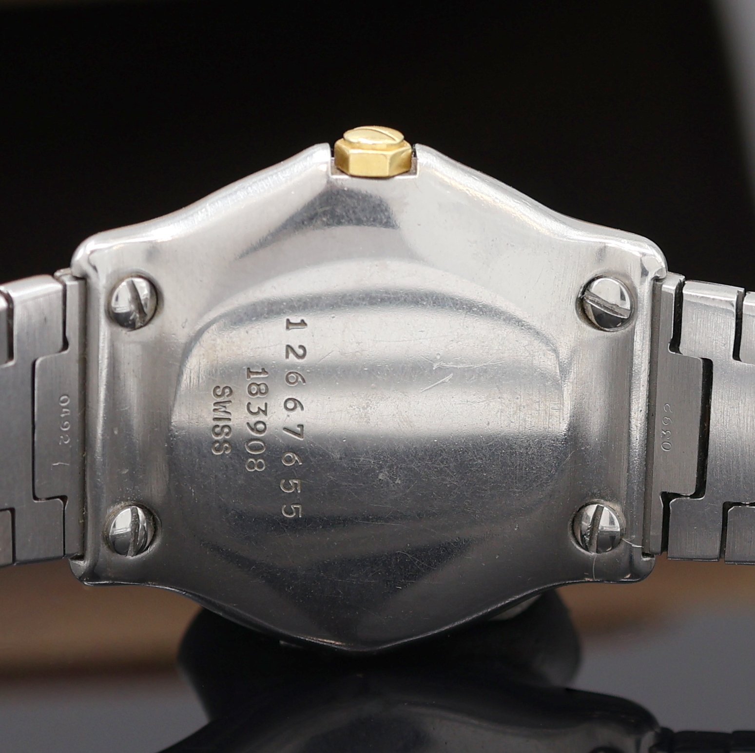 Detail e: EBEL Damenarmbanduhr Classic Wave in Stahl/Gold Referenz 183908, Schweiz um 1993, quarz, Lünette gegen Geh. 5-fach verschr., orig. Wellengliederband ...