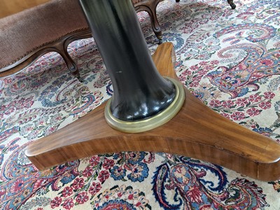 27118539f - Salon table, France, mahogany veneer, 19th century, black round column on a three-pass ...