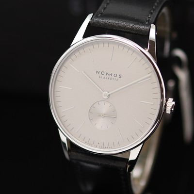 27119006a - NOMOS Orion 38 ungetragene Armbanduhr Referenz 383, Handaufzug, beids. vergl. Geh. inkl. ...