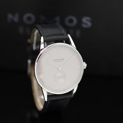 27119006b - NOMOS Orion 38 ungetragene Armbanduhr Referenz 383, Handaufzug, beids. vergl. Geh. inkl. ...