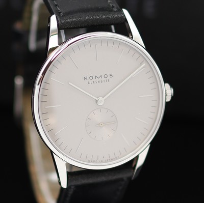 27119006c - NOMOS Orion 38 ungetragene Armbanduhr Referenz 383, Handaufzug, beids. vergl. Geh. inkl. ...
