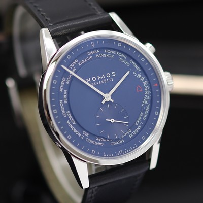27119038c - NOMOS ungetragene Herrenarmbanduhr Zürich Weltzeit Referenz 807, Automatik, beids. ...