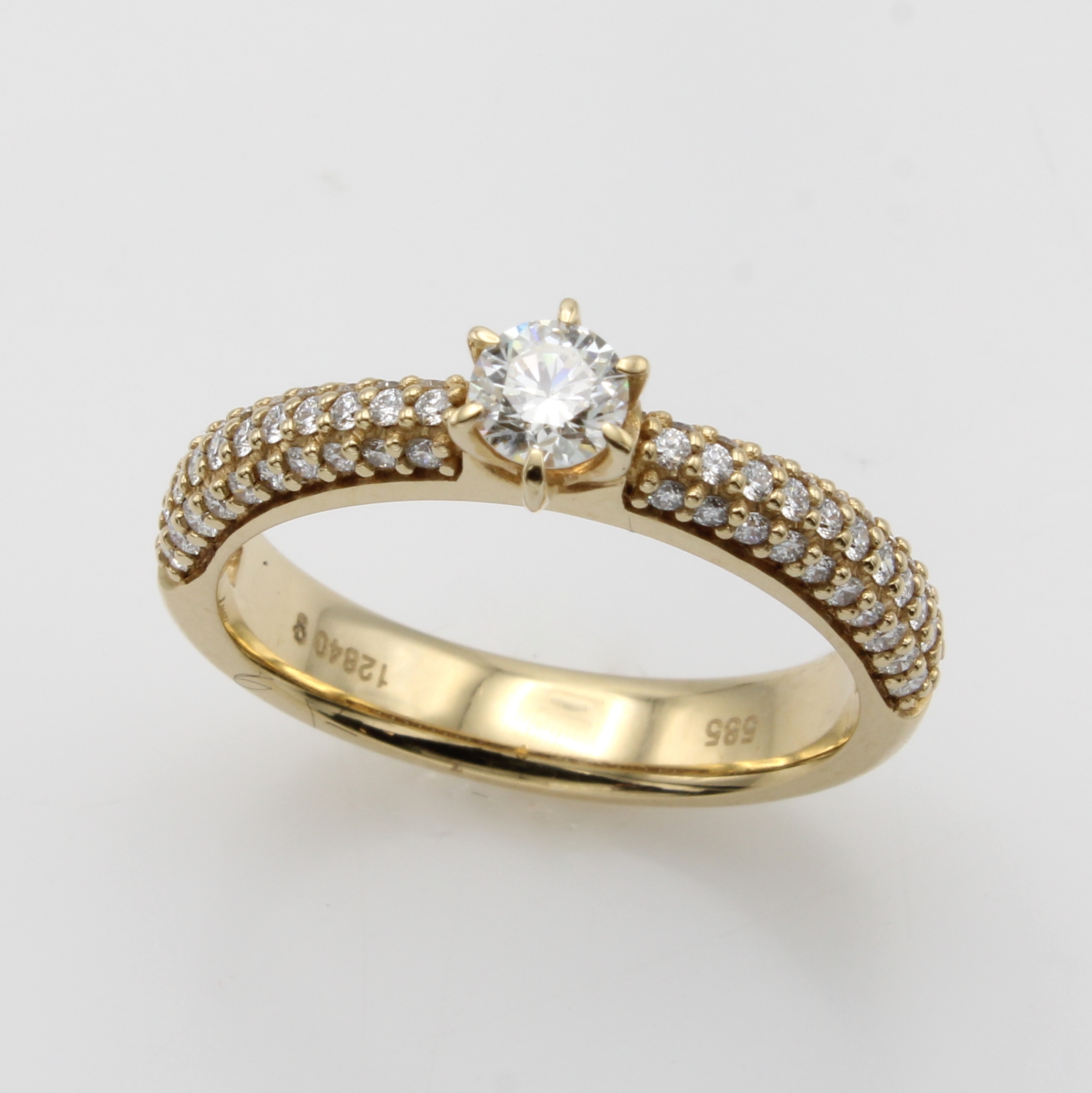 Image 27119492 - Ring mit Brillanten, GG 585/000, Solitär in Krappenfassung ca. 0.30 ct u. Besatzbrill. ...