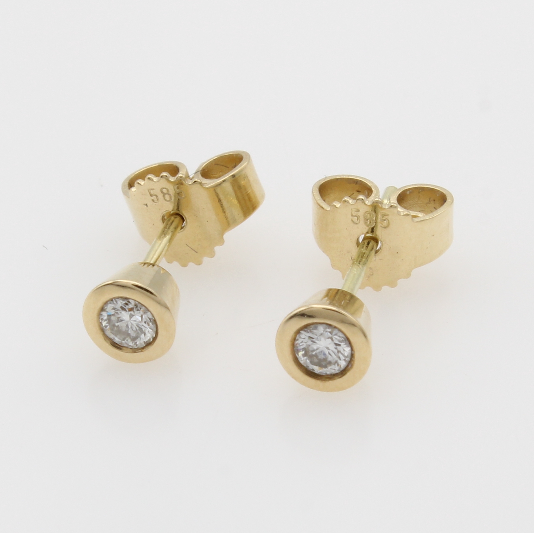 Image 27119495 - Paar Ohrstecker mit Brillanten, GG 585/000, 2 Brill. in glatten Fassungen zus. ca. 0.15 ...