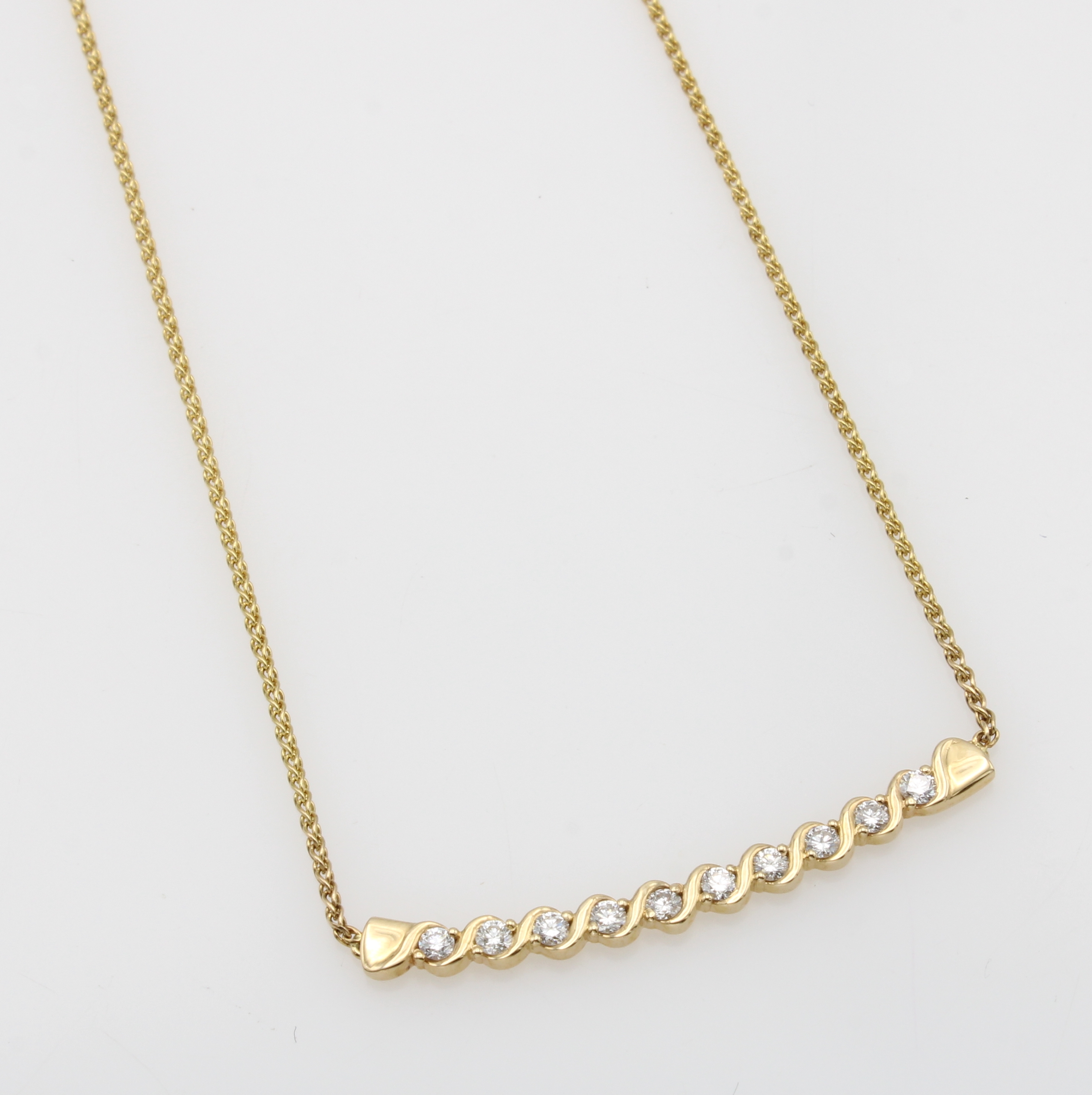 Image 27119510 - Collier mit Brillanten, GG 585/000, 10 Brill. in geschwungenen Fassungen zus. ca. 0.25 ...