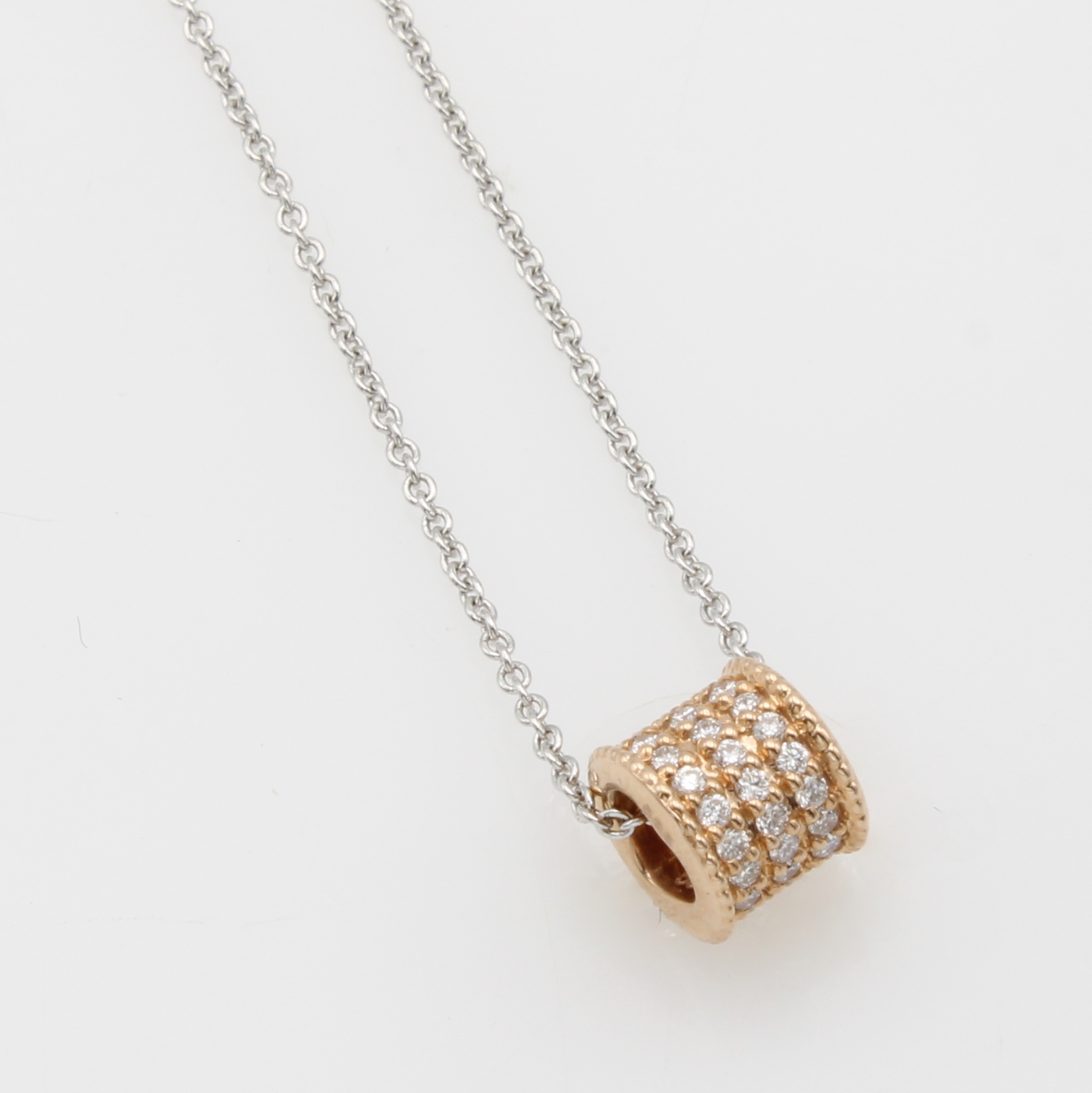 Image 27119612 - Anhänger ´Röllchen´ mit Brillanten an Kette, RG/WG 585/000, Brill. zus. ca. 0.15 ct ...