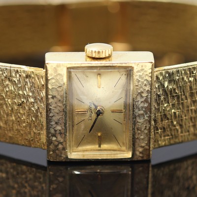 27120691a - DUGENA Damenarmbanduhr in GG 585/000, Schweiz um 1965, Handaufzug, Goldband in GG ...