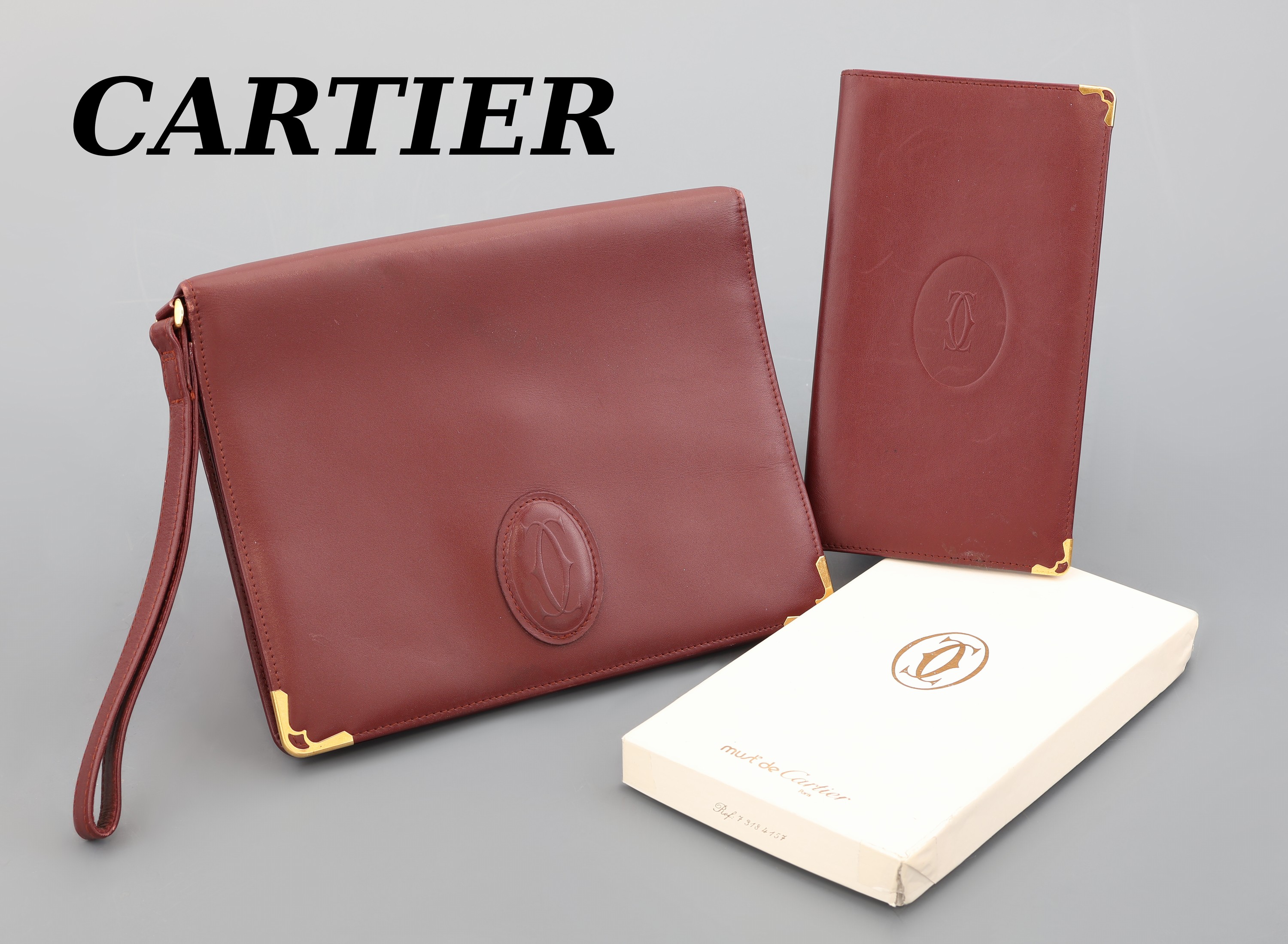 Image 27121375 - CARTIER Konvolut 2 Leder Accessoires, bordeauxrotes Leder, 1 x Agendamappe mit ...