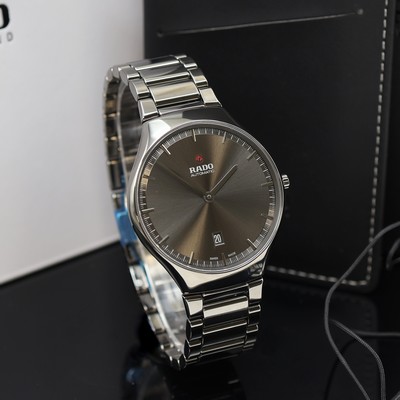 27121311a - RADO True Thinline ungetragene Herrenarmbanduhr Referenz R27088102, Automatik, beids. ...