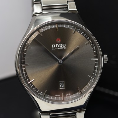 27121311b - RADO True Thinline ungetragene Herrenarmbanduhr Referenz R27088102, Automatik, beids. ...