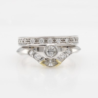 Image Ring mit Brillanten und Diamant, WG 750/000, Solitär u. Besatzbrill. zus. ca. 0.32 ct ...