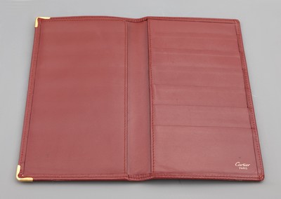 27121375a - CARTIER Konvolut 2 Leder Accessoires, bordeauxrotes Leder, 1 x Agendamappe mit ...