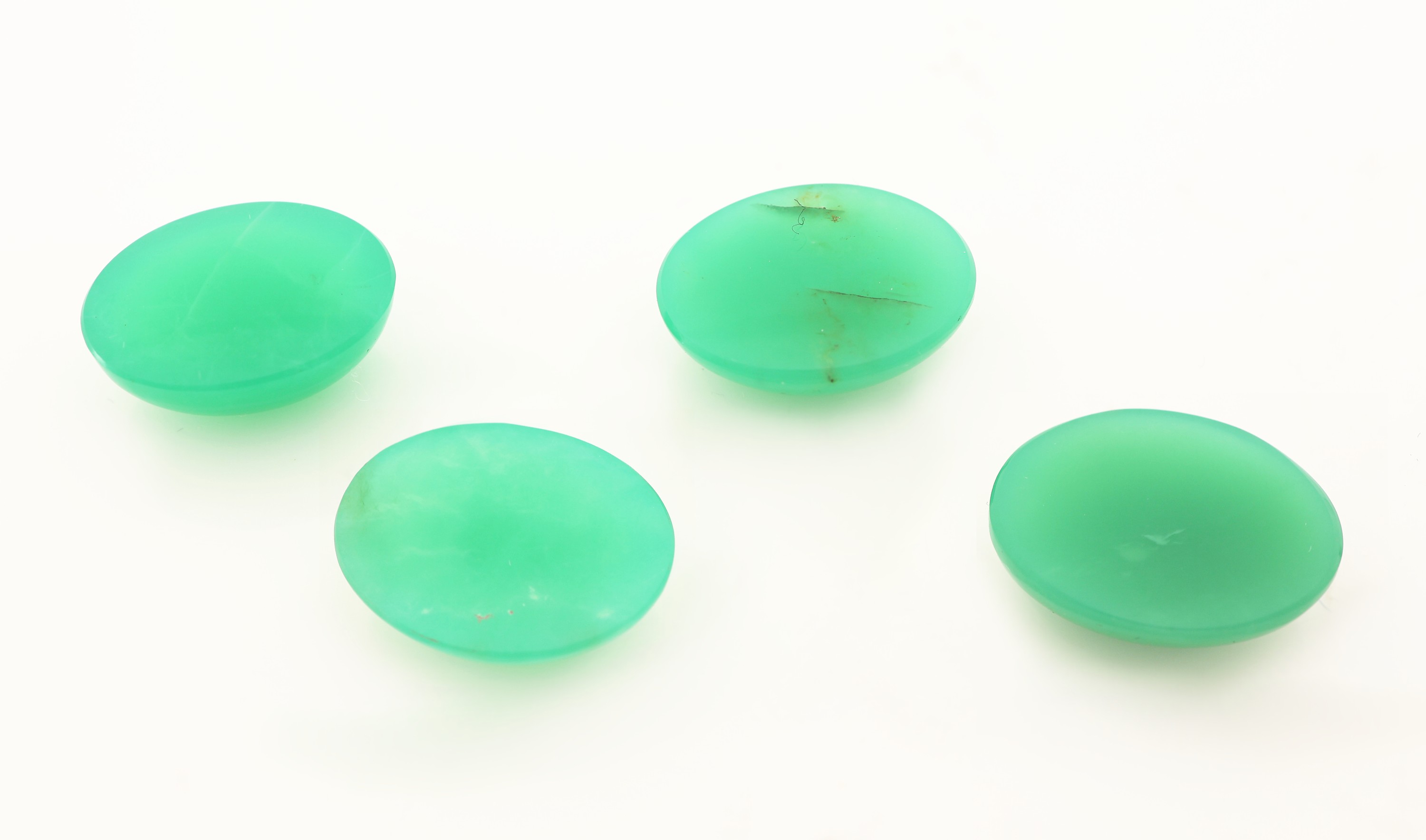Detail a: Lot 4 lose Chrysopras-Cabochons, 29.51 ct, oval