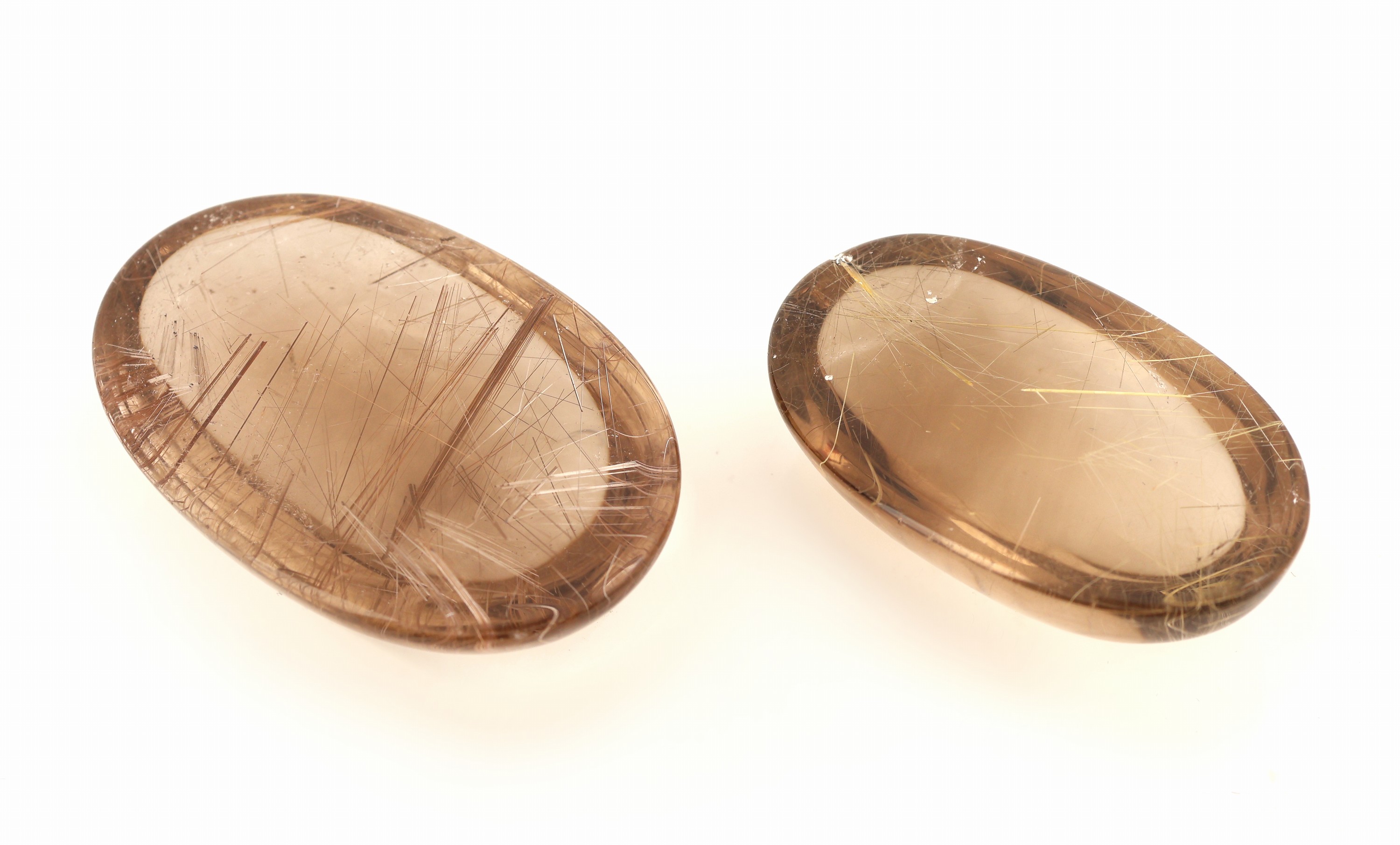 Detail a: Lot 2 lose Rutilquarz Cabochons zus. 163.26 ct, oval, in versch. Größen