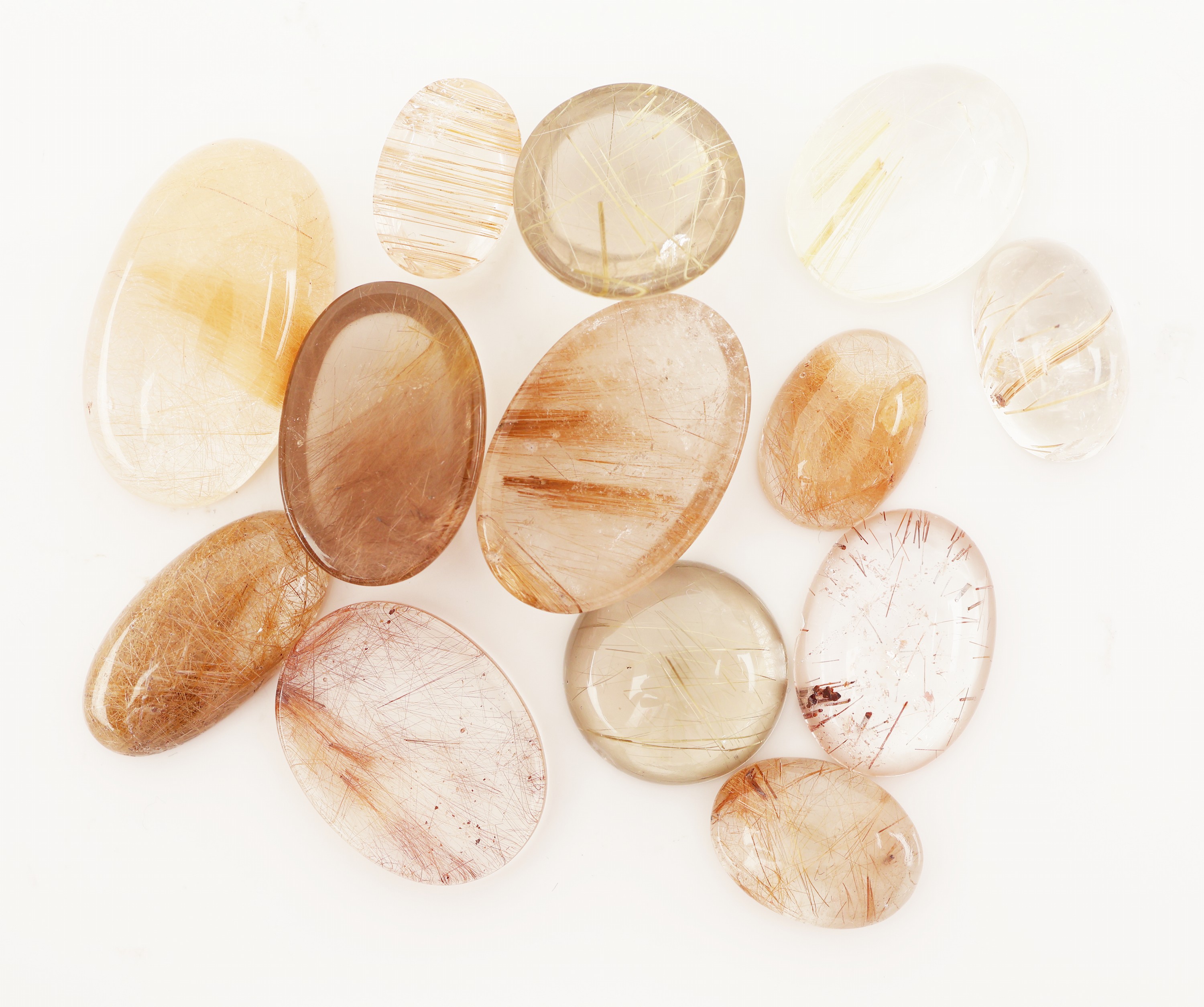 Detail a: Lot 13 lose Rutilquarz Cabochons, zus. 133.98 ct, oval, in versch. Größen