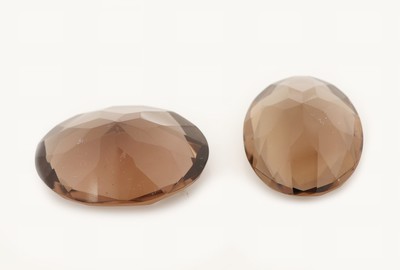 27121512a - Lot 2 lose facett. Rauchquarze zus. 40.40 ct, oval im Scherenschliff Schätzpreis: 350, - ...