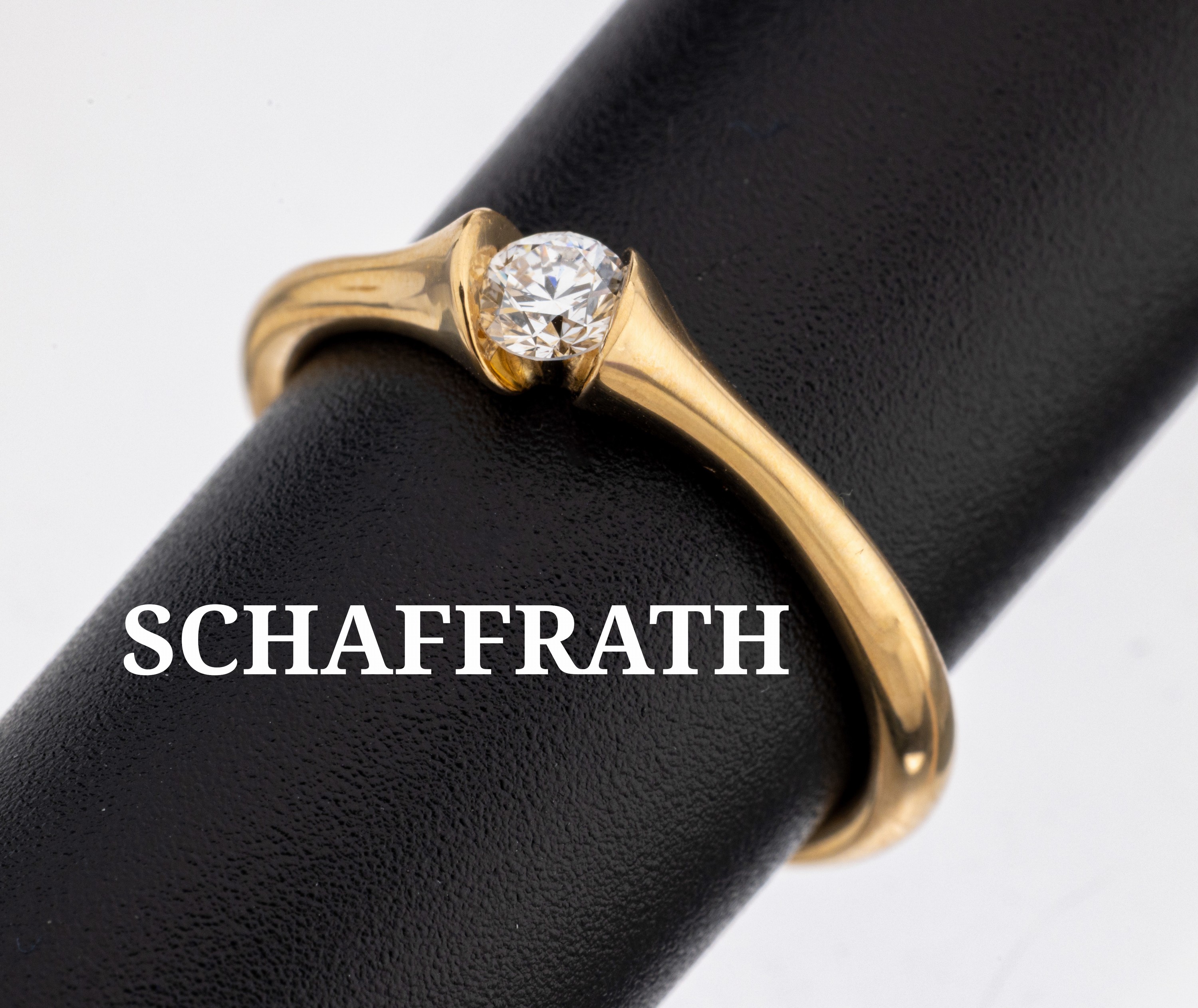 Image 27121618 - 18 kt Gold SCHAFFRATH Brillant-Ring, GG 750/000, 1 Brillant ca. 0.185 ct feines Weiß ...