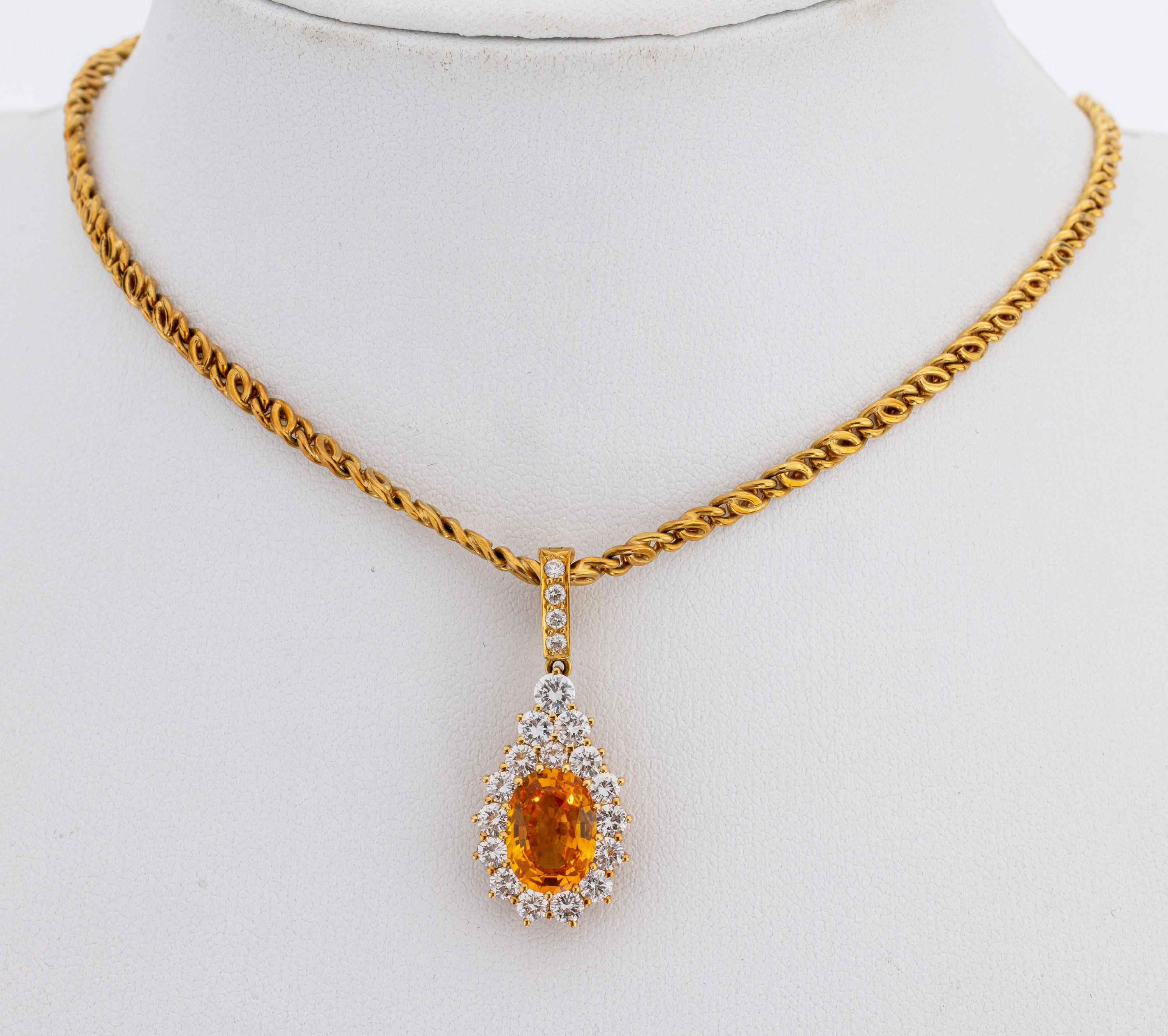 Image 27121648 - 18 kt Gold Saphir-Brillant-Clipanhänger, GG750/000, mittig ovalfacett. orangefarb. ...